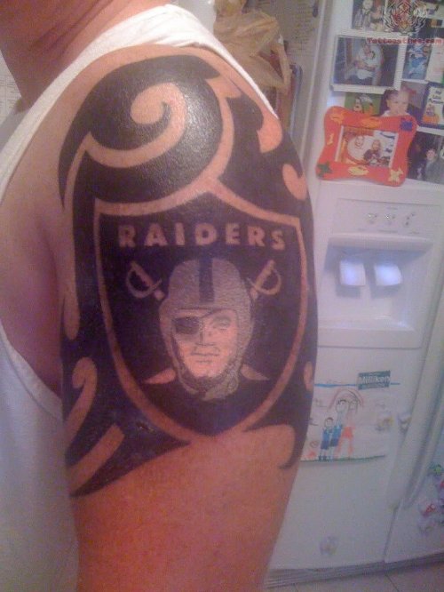 Oakland Raiders Logo And Tribal Tattoo On Shoulder